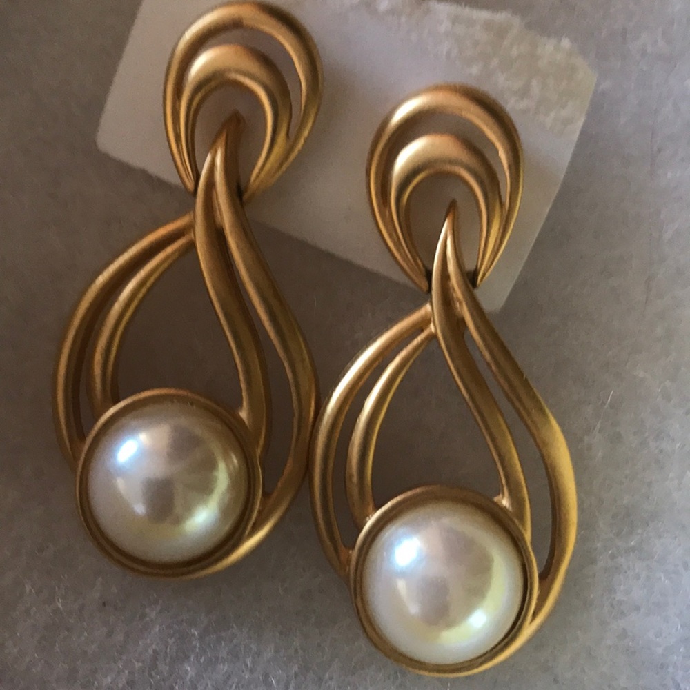 Never used gold and pearl earrings.